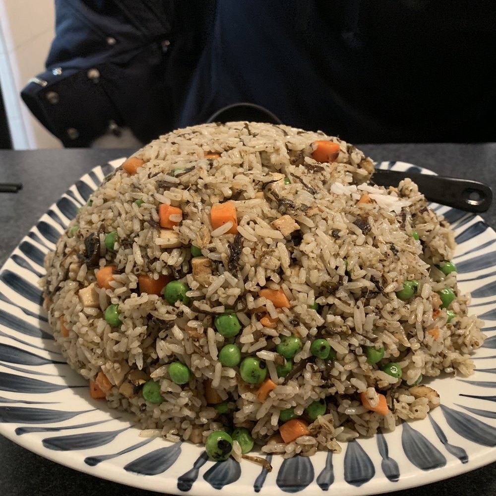 Preserved olive leaves, ginger and soya chicken fried rice Preserved olive leaves, ginger and soya chicken fried rice