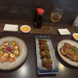 F5. Tsunami Blossom Roll , crispy rice spicy , tuna volcano roll and plum wine F5. Tsunami Blossom Roll , crispy rice spicy , tuna volcano roll and plum wine