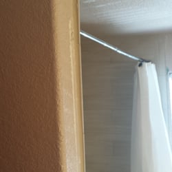 Lake Travis Interior Renovations - This is how they left the wall edge with the tile protruding unevenly