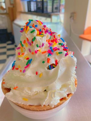 Photo of Calder Bros. Dairy - Lincoln Park, MI, US. Waffle bowl sundae with whipped cream and sprinkles. Wow!