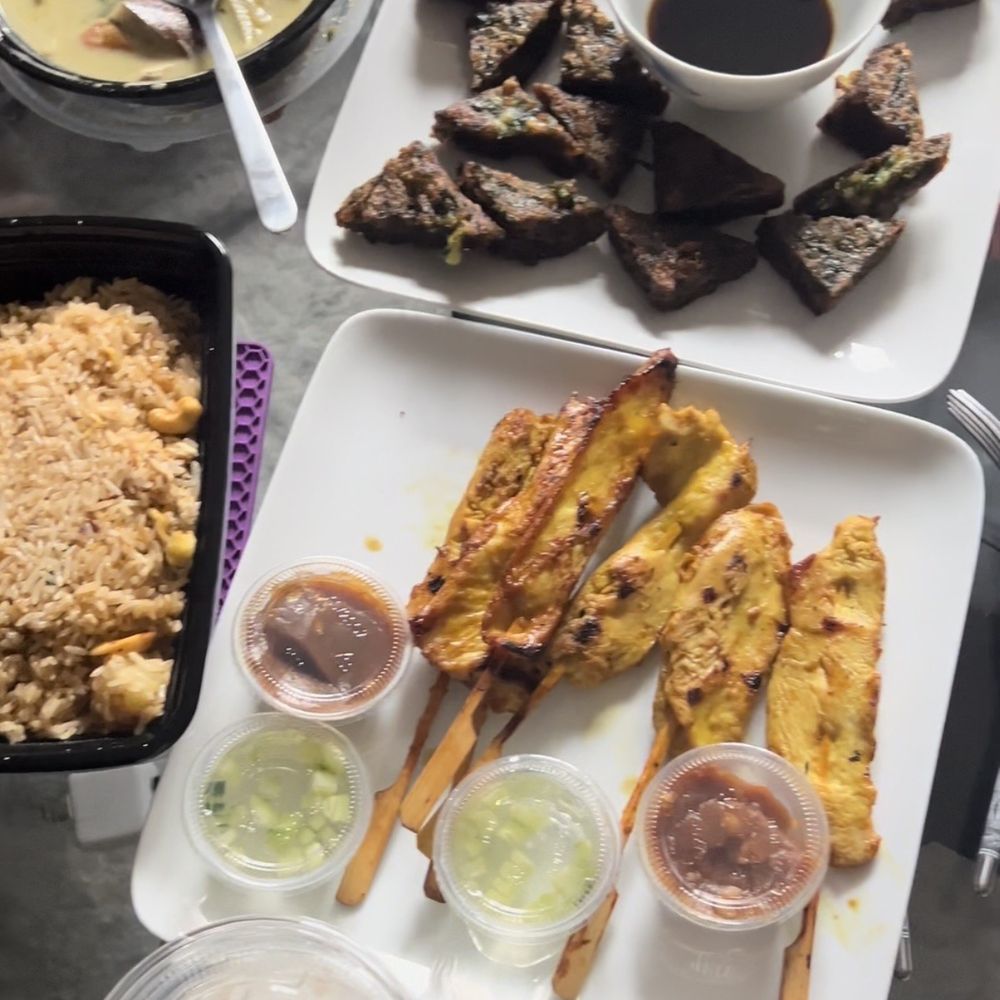 UThai - Grilled Chicken Satay, Green Curry chicken, Pineapple Fried Rice, Fried Chive Dumplings, Lychee Juice - Thai Near Me - Rego Park, New York UThai - Grilled Chicken Satay, Green Curry chicken, Pineapple Fried Rice, Fried Chive Dumplings, Lychee Juice - Thai Near Me - Rego Park, New York