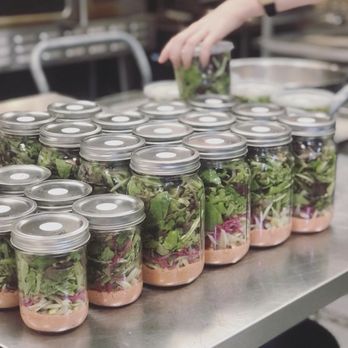 Goodness Cooks - a table full of mason jars filled with salads - Gluten-Free Near Me - Chapel Hill, North Carolina Goodness Cooks - a table full of mason jars filled with salads - Gluten-Free Near Me - Chapel Hill, North Carolina