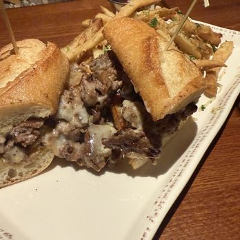The Vig - Philly cheesesteak with truffle fries - American Near Me - Mesa, Arizona The Vig - Philly cheesesteak with truffle fries - American Near Me - Mesa, Arizona