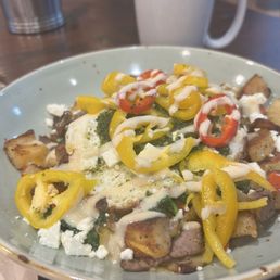 Chimcurri Steak and Eggs - Great presentation, mostly peppers onions and potatoes. Maybe 3 or 4 slivers of steak. Chimcurri Steak and Eggs - Great presentation, mostly peppers onions and potatoes. Maybe 3 or 4 slivers of steak.