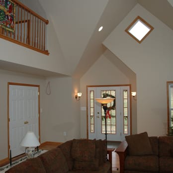 Stonegate Construction Inc. - a living room with a christmas tree - General Contractors Near Me - Purcellville, Virginia