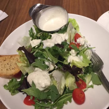 Bluewater Grill - Garden salad - fresh with arugula, ripe sweet grape tomatoes and a crostini. - Seafood Near Me - Temecula, California Bluewater Grill - Garden salad - fresh with arugula, ripe sweet grape tomatoes and a crostini. - Seafood Near Me - Temecula, California