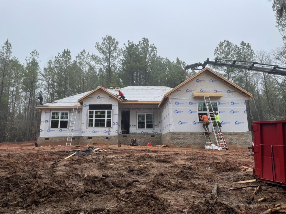 Slide of RC Roofing Contractor