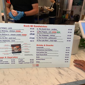 Nom Nom Banh Mi - Menu and hubby's hand. Lol - Vietnamese Near Me - Berkeley, California