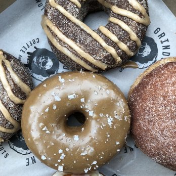 Grindstone Coffee & Donuts - Apple cider, maple sea salt, glazed and cinnamon sugar - Donuts Near Me - Sag Harbor, New York Grindstone Coffee & Donuts - Apple cider, maple sea salt, glazed and cinnamon sugar - Donuts Near Me - Sag Harbor, New York