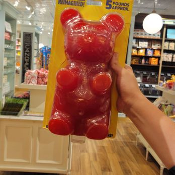 Lolli and Pops - a person holding a gummy bear - Candy Stores Near Me - The Woodlands, Texas Lolli and Pops - a person holding a gummy bear - Candy Stores Near Me - The Woodlands, Texas