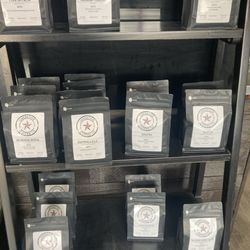 Liberation Coffee Company - Bags of coffee for purchase.