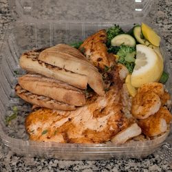 The Marketplace Grill Cafe - Salmon & Shrimp. Also includes steamed vegetables, risotto, and focaccia bread