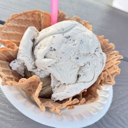 Stella’s Homemade Ice Cream - Oreo cookie scoop with a scoop of coffee ice cream on the bottom