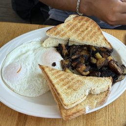 Two eggs your way, extra crispy home fries Two eggs your way, extra crispy home fries