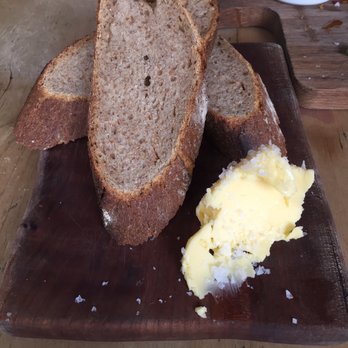 The Pig and Butcher - Extra bread with butter and beef drippings - British Near Me - London, XGL The Pig and Butcher - Extra bread with butter and beef drippings - British Near Me - London, XGL