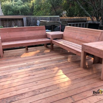Bee Vera Construction - a wooden bench and bench on a deck - General Contractors Near Me Bee Vera Construction - a wooden bench and bench on a deck - General Contractors Near Me