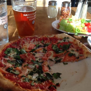 Piecasso - Tree hugger with red sauce, Harpoon Citra Victorius, and garden salad - Pizza Near Me - Stowe, Vermont Piecasso - Tree hugger with red sauce, Harpoon Citra Victorius, and garden salad - Pizza Near Me - Stowe, Vermont
