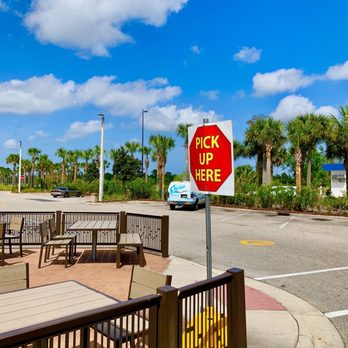 McDonald's - a stop sign on a street corner - Burgers Near Me - New Smyrna Beach, Florida McDonald's - a stop sign on a street corner - Burgers Near Me - New Smyrna Beach, Florida