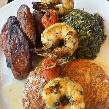 Swahili Village - Salmon and shrimp entree with plantain and spinach- yummy - African Near Me - Newark, New Jersey
