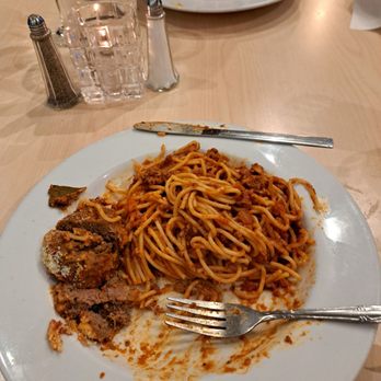 Trattoria Cattaneo - a plate of spaghetti and meat - Italian Near Me - Santa Rosa, California