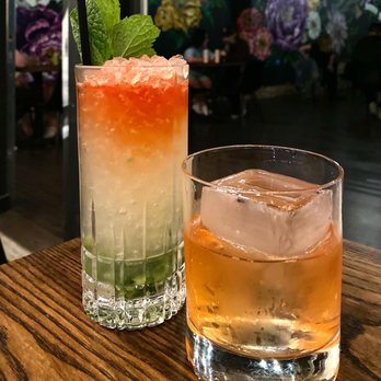 the L - two cocktails on a wooden table - Cocktail Bars Near Me - Denver, Colorado