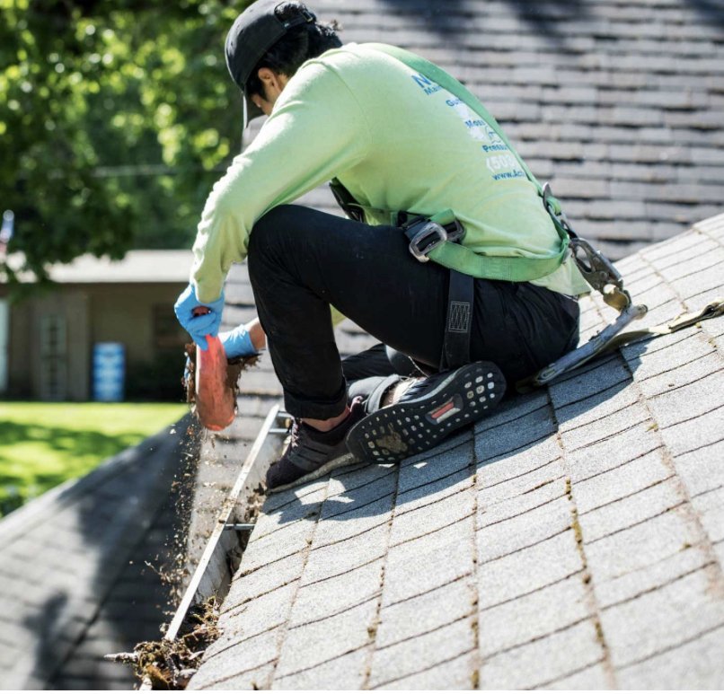 Slide of Pro Gutters cleaning and roofing 