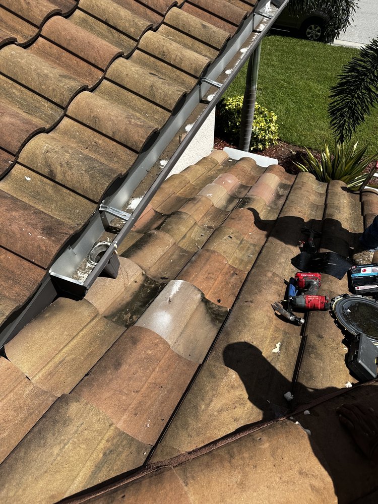 Slide of Tropical Roofing Services