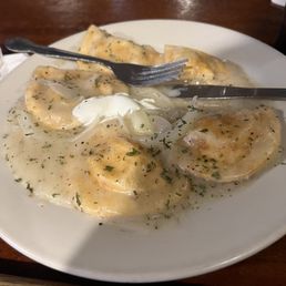 Pirogies in garlic butter sauce
