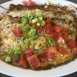 Enchilada Omelette with hash browns on the side! Enchilada Omelette with hash browns on the side!