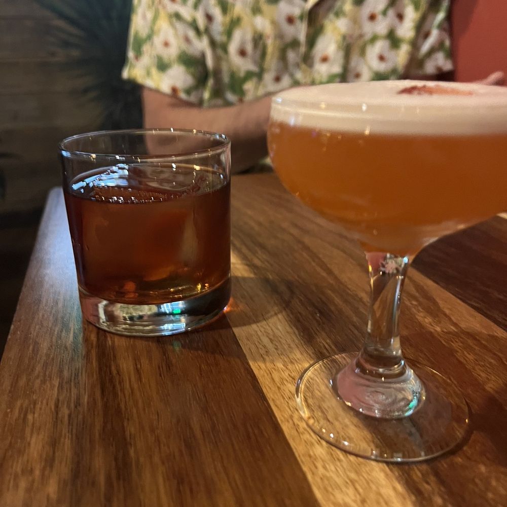 La Doña Mezcaleria - Olas de rubi (mezcal, strawberry cocktail) and baya vieja (tequila, whiskey, blackberry, vanilla) - Mexican Near Me - Denver, Colorado La Doña Mezcaleria - Olas de rubi (mezcal, strawberry cocktail) and baya vieja (tequila, whiskey, blackberry, vanilla) - Mexican Near Me - Denver, Colorado