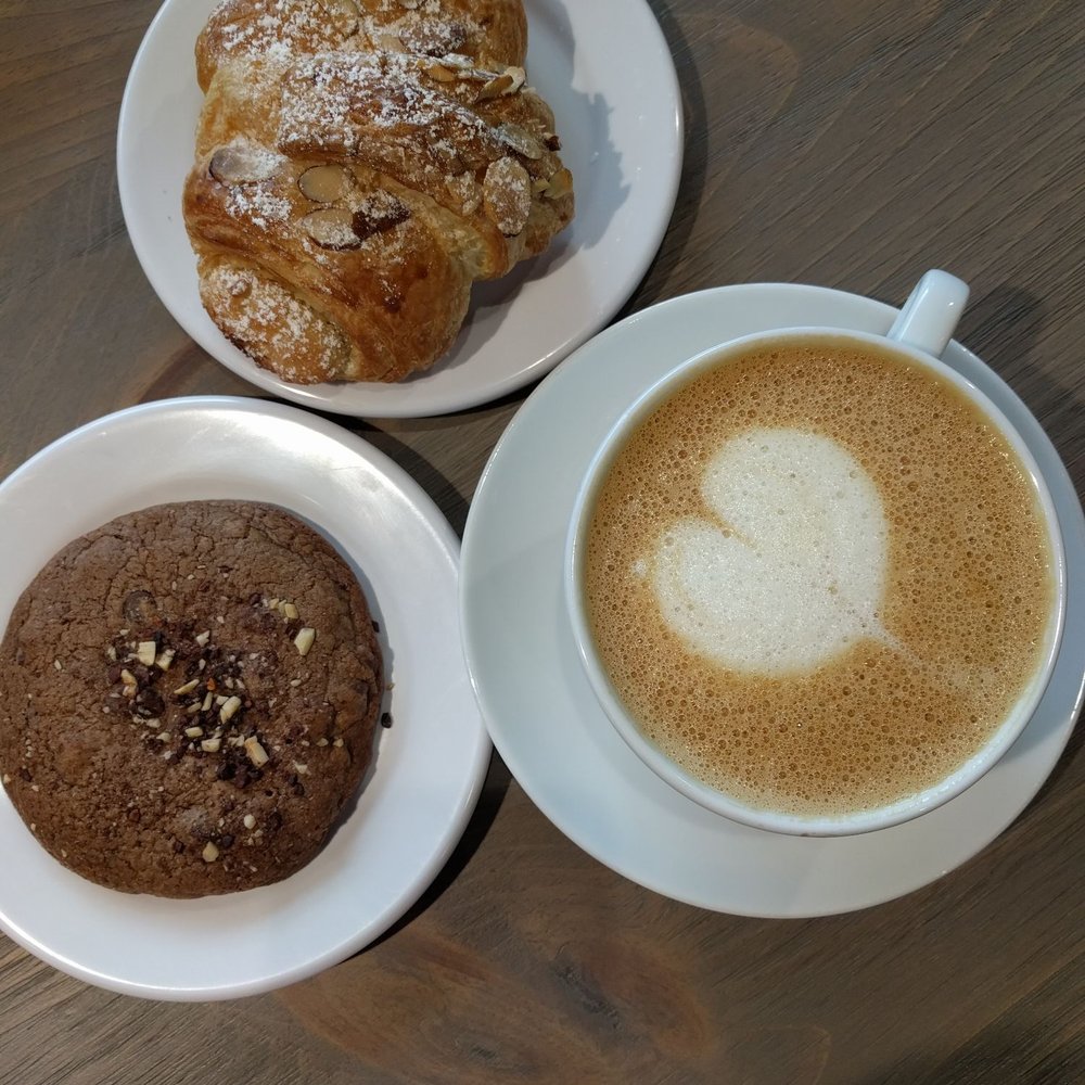 Pavement Coffeehouse - Almond croissant, double chocolate chip cookie, eggnog latte - Coffee & Tea Near Me - Brighton, Massachusetts Pavement Coffeehouse - Almond croissant, double chocolate chip cookie, eggnog latte - Coffee & Tea Near Me - Brighton, Massachusetts