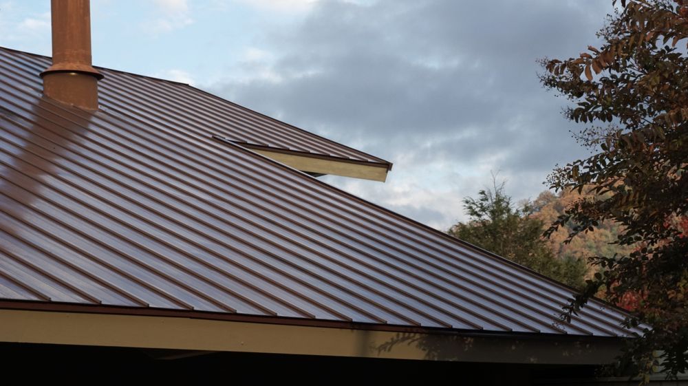 Slide of Top Notch Roofing