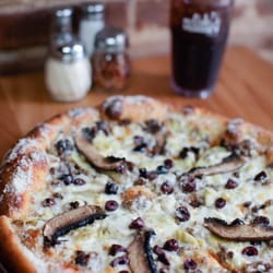 Oil and garlic base with kalamata olives, portobello mushrooms, artichoke hearts, steak and feta cheese! philosophers pie!