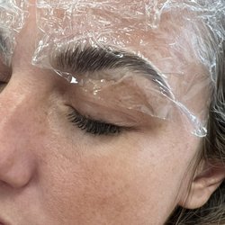 Three’s Company Beauty & Brow Room - Brow laminating in process
