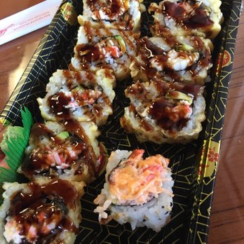 Sushi Corner - Eel tempura roll and 1 volcano roll - Sushi Bars Near Me - Miami, Florida Sushi Corner - Eel tempura roll and 1 volcano roll - Sushi Bars Near Me - Miami, Florida
