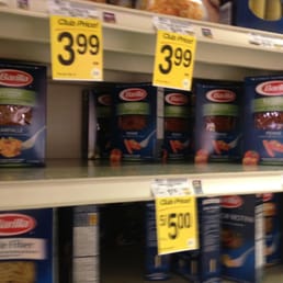 a shelf of food items for sale