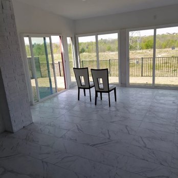 DTX Flooring & Design - two chairs facing a balcony - Flooring Near Me - Plano, Texas