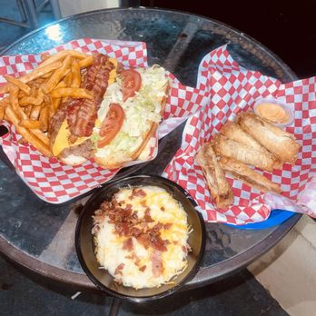 Tru Bistro - Bacon cheeseburger, fries, eggrolls, loaded mashed potatoes. - Sports Bars Near Me - Columbia, South Carolina