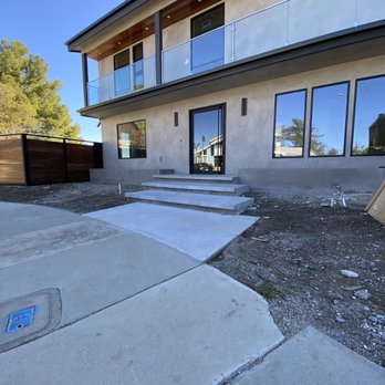 Genesis Construction - the front of a house with a ramp - Landscaping Near Me Genesis Construction - the front of a house with a ramp - Landscaping Near Me