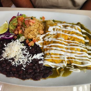 RJ Skillets - Green sauce shrimp enchiladas - Mexican Near Me - Portland, Oregon RJ Skillets - Green sauce shrimp enchiladas - Mexican Near Me - Portland, Oregon