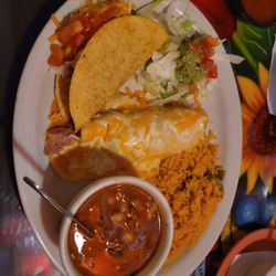 Jaliscos Mexican Restaurant - Chicken enchilada with crema sauce, ground beef crispy taco, borracho beans