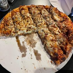 Swanny’s - Pizza, sausage, pepperoni and mushroom.