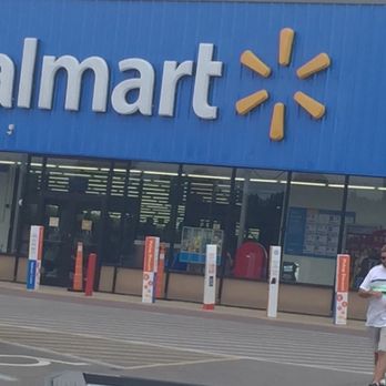 Walmart - a man walking in front of a walmart store - Department Stores Near Me - Eldon, Missouri Walmart - a man walking in front of a walmart store - Department Stores Near Me - Eldon, Missouri