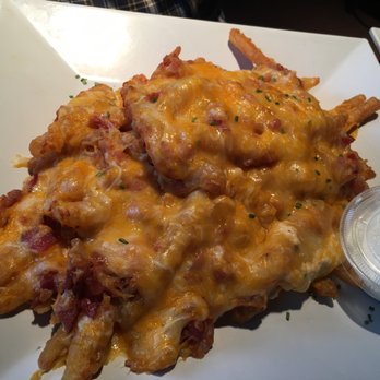 Looney's Pub - O lawd cheesy bacon fries with ranch sauce - American Near Me - College Park, Maryland