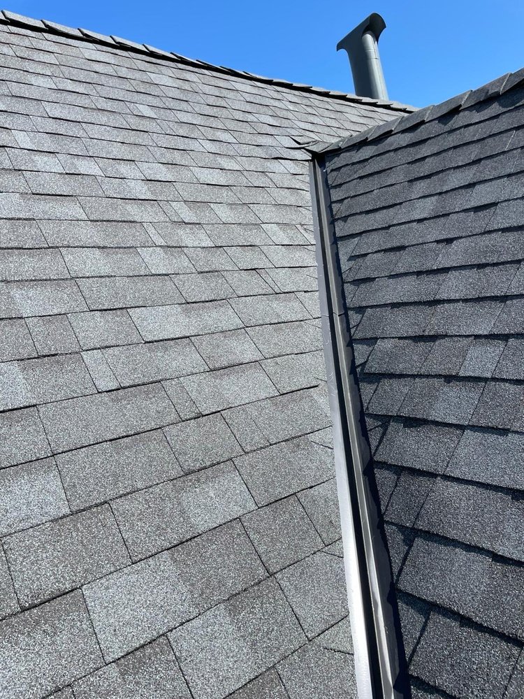 Slide of Equinox Roofing