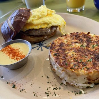 Snooze, an A.M. Eatery - Breakfast sandwich - pretzel bun for win. So good! - Breakfast & Brunch Near Me - Ft Collins, Colorado Snooze, an A.M. Eatery - Breakfast sandwich - pretzel bun for win. So good! - Breakfast & Brunch Near Me - Ft Collins, Colorado