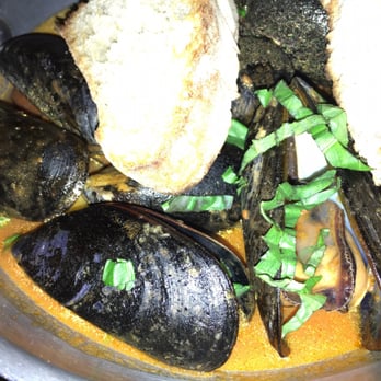 Vite Vinosteria - Mussels with spicy tomatoes - Italian Near Me - Astoria, New York Vite Vinosteria - Mussels with spicy tomatoes - Italian Near Me - Astoria, New York