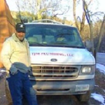 TJM Plumbing & Building - a man standing next to a truck - Plumbing Near Me - Rocky Gap, Virginia TJM Plumbing & Building - a man standing next to a truck - Plumbing Near Me - Rocky Gap, Virginia