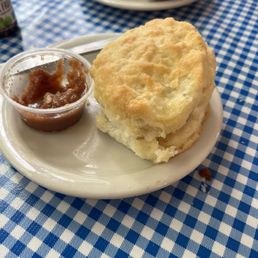 First they serve you a huge biscuit with homemade apple butter. First they serve you a huge biscuit with homemade apple butter.