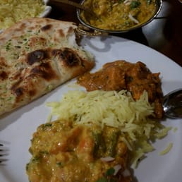 Chicken tikka masala, veggie korma, and garlic naan. Sooooo gooood. #cominghome
